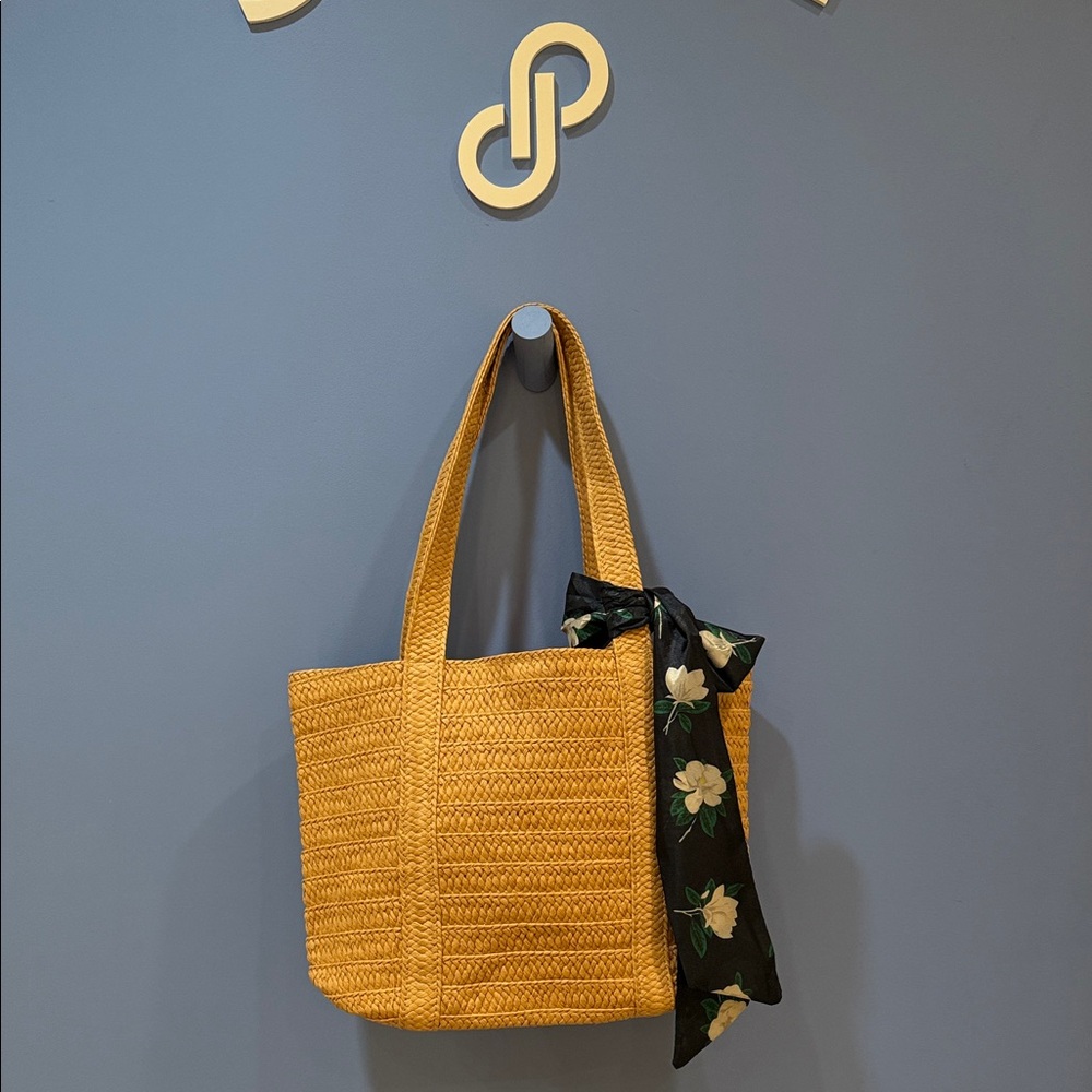 Elegant Tan Woven Tote Bag with Floral Scarf